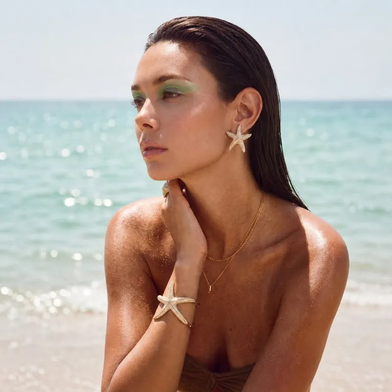 FormaNova beach jewelry result showing starfish earring and bangle naturally worn